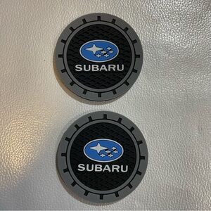 Black and Gray Circular Automotive Emblems